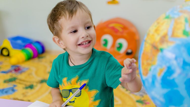 child having fun and being happy at school