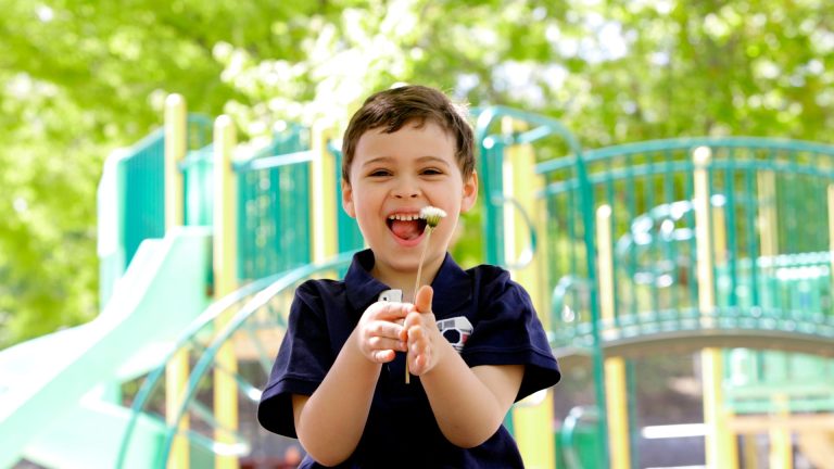 child having fun in the garden